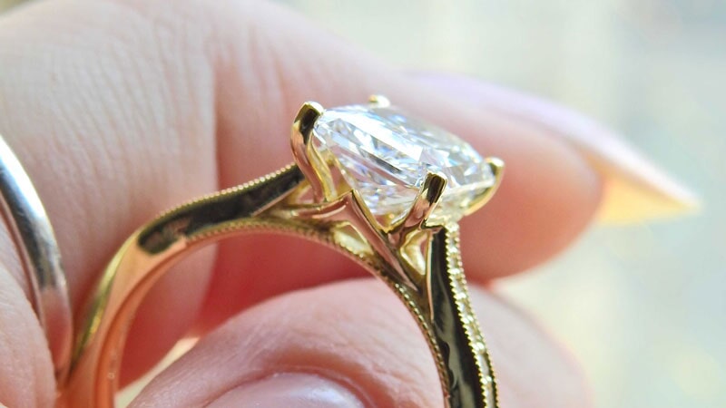 Diamond ring in a hand