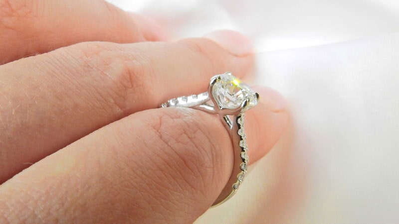 Diamond ring on finger