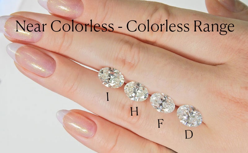 Oval cut diamonds with I, H, F, and D color on hand